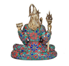 Brass Shiva statue meditating, crown and trident with multicolor patterned base