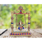 Brass Lord Ganesha On Swing Decorative Showpiece Idol Blue & Red - (Brass, Height 10.25")