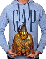 Brass Tulja Bhavani statue held in hands, seated figure with crown and gold face