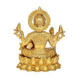 Rear view golden brass Lakshmi statue with halo details and four raised hands