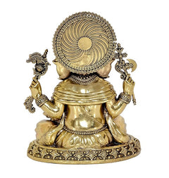 Brass Ganesha idol back view, circular halo design, seated form with ornate jewelry