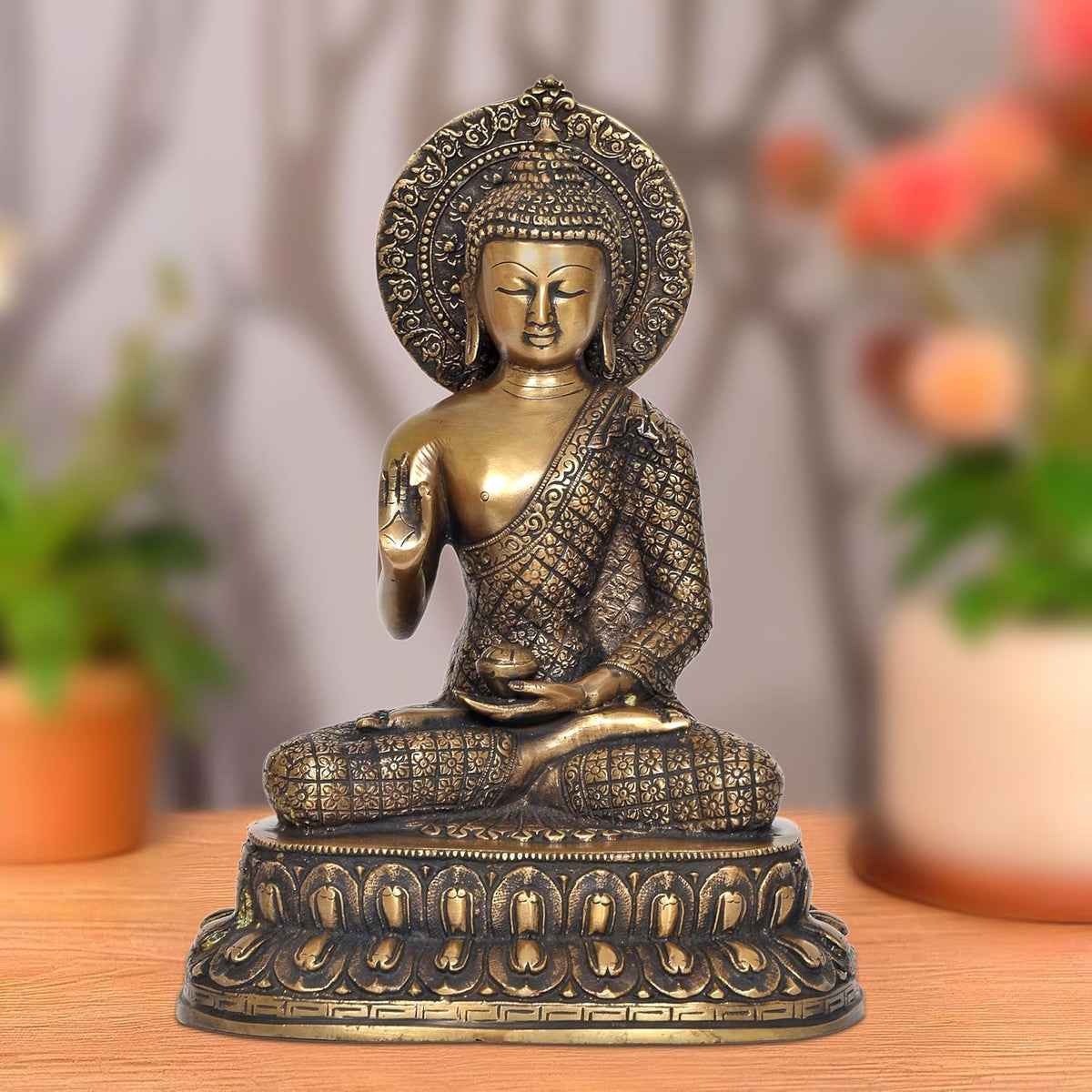 Brass dhyan mudra Buddha statue, seated meditating with raised hand and detailed robe