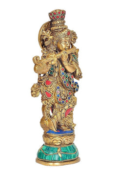 Brass Radha Krishna statue from side, circular halo detail, colorful gem-studded robe
