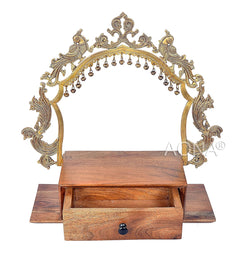 Brass arched mandir frame with dangling bells, open drawer and wooden platform base