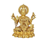 Golden brass Lakshmi idol in seated pose, raised hands and detailed jewelry