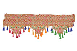 Decorative toran door hanging with round medallions and colorful hanging tassels