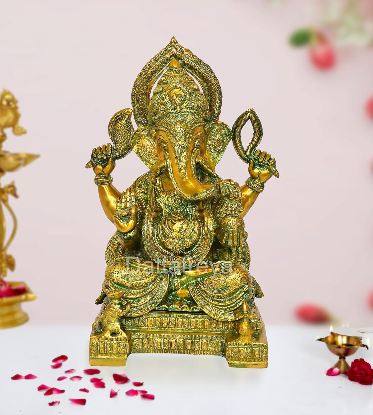 Brass Ganesha statue, multi-color finish; seated with four arms and detailed crown