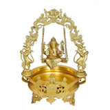 Brass Ganesha swing urli with arched frame, seated Ganesha, and side figure supports