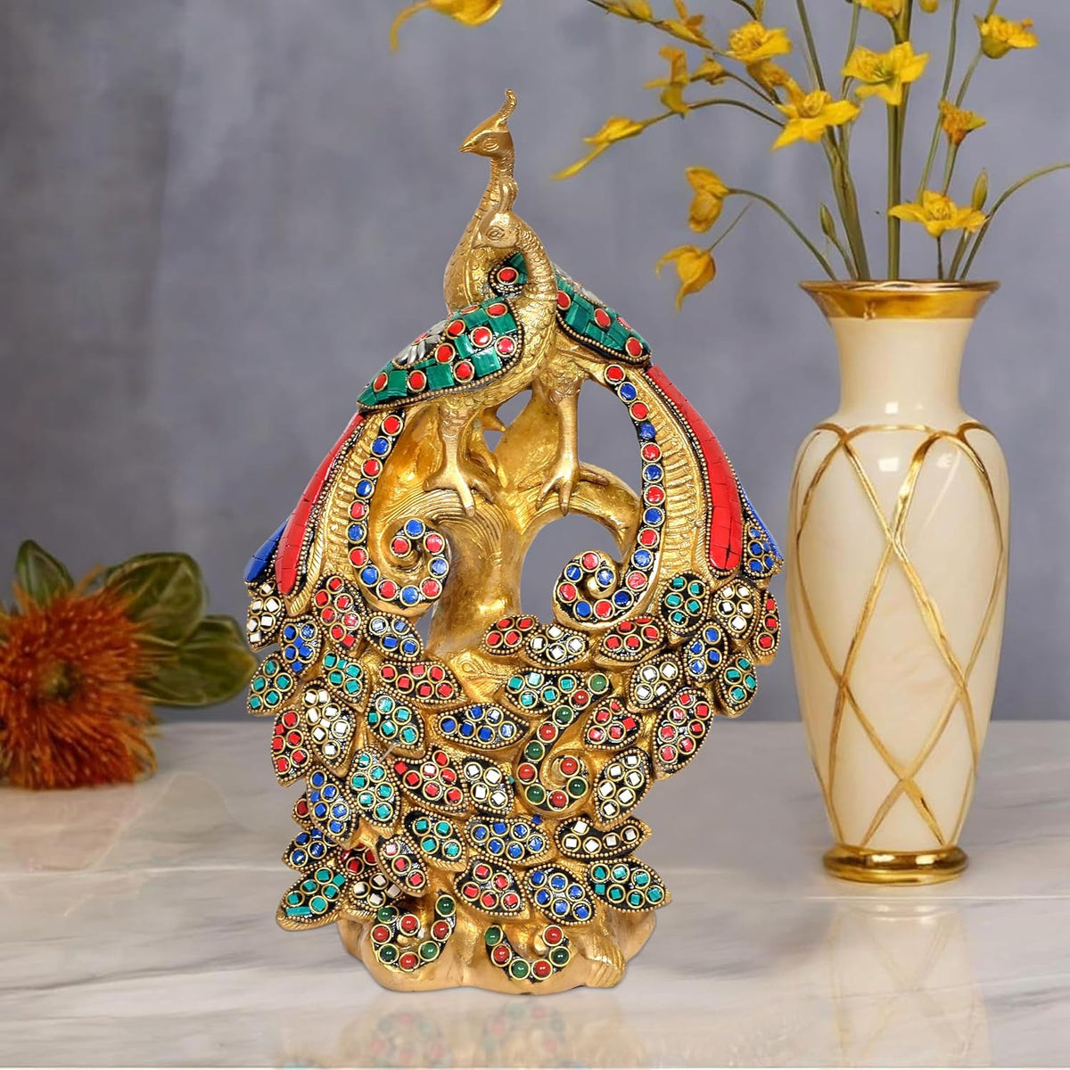 Brass gold peacock showpiece with red, blue, green jeweled details for table decor