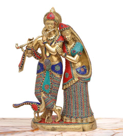 Brass Radha-Krishna idol, full view; Krishna with flute and peacock-feather headpiece