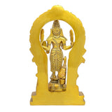 Brass Kartik idol standing with arms raised, ornate arch backplate, 7 inch height