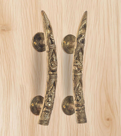 Ganesha brass door handles with two lever handles and circular round backplates, golden finish