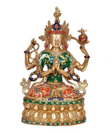 Front view Tara Devi brass goddess idol, seated with four arms, crown and blue-red jewels