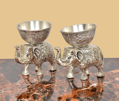 Silver elephant metal showpiece bowls, side view pair with embossed patterns, empty cups