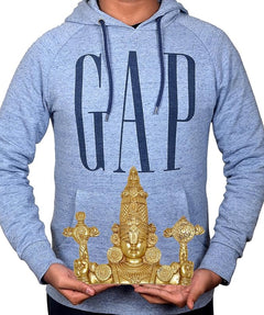 Brass Tirupati Balaji bust wall hanging figurine shown held in hands, 6 in