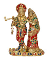 Brass Radha Krishna statue idol on ornate round base, colorful beadwork outfits