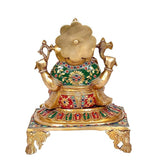 Back view of brass Ganesha idol statue with colorful jeweled back ornament