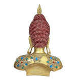 Resin Buddha bust sculpture, back view with red beaded crown and gold jewel-studded details