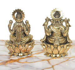 Rear view brass Lakshmi and Ganesh statues on lotus bases, decorative back details