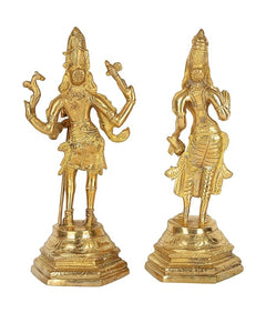 Shiv Parvati brass statue pair, one holding trident, one holding small drum