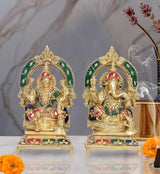 Brass Lakshmi and Ganesha statue with green halo arch and seated goddess and god