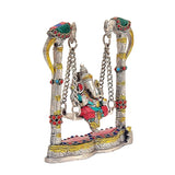 Back/side view of Ganesha jhula swing idol, two pillar legs with jeweled details