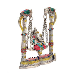 Back/side view of Ganesha jhula swing idol, two pillar legs with jeweled details