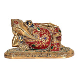 Lying Ganesha brass statue with red, green and blue gem-style inlays and gold details