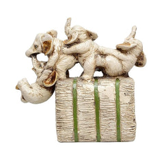 Polyresin elephant playing figurines stacked on striped textured block