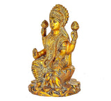 Lakshmi Maa brass statue in profile, seated with four arms and ornate headdress