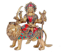 Brass Mother Goddess Durga statue on lion, front view, ornate colorful inlay