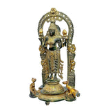 Brass Lakshmi idol with raised hands and detailed draped ornaments, front view