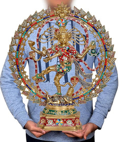 AONA brass Natraj idol held in hands, multicolor arch and base visible