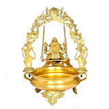 Brass Ganesha swing urli front view with arched frame, seated Ganesha, and tray bowl