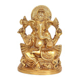 Brass Raja Ganesh idol statue, front view with raised hands and halo