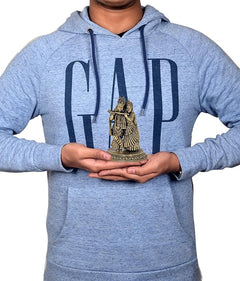 Radha Krishna brass idol held in hands, standing pose on round base