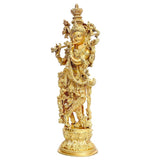 Brass Murli Manohar Krishna figurine holding staff, detailed crown and ornaments