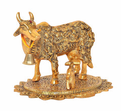 Metal cow-with-calf statue, profile view with side bell and richly textured body