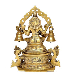 Back view brass Saraswati idol with ornate halo medallion and four bells