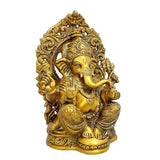 Ganesha brass sitting idol, detailed jewelry and raised trunk pose, antique gold finish
