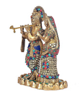 Brass Radha Krishna idol, Krishna with flute and Radha beside him on pedestal.