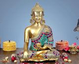Brass Buddha statue in earth-touching pose, teal and red jeweled robe, seated 16 in