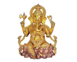 Brass Ganesh idol with ornate crown, raised arms and lotus base