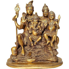 Brass Shiva Parivar showpiece with four seated figures and raised tridents, 12 inch.