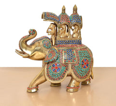 Front three-quarter view of brass riding elephant statue with beaded body panels and crown