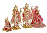 Ram Darbar brass statues with four figures, red dresses, gold trim, draped veil, eye-work