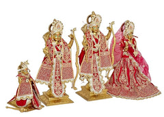 Ram Darbar brass statues with four figures, red dresses, gold trim, draped veil, eye-work