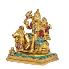 Brass Shiv Parivar statue side view, seated figures, red beads, turquoise patterns, green base