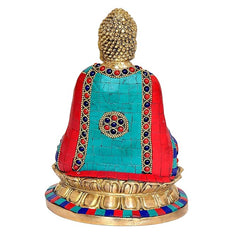 Buddha statue back view, multicolored mosaic robe on lotus base