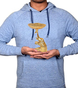 Golden metal elephant dry fruit bowl held in hands for scale